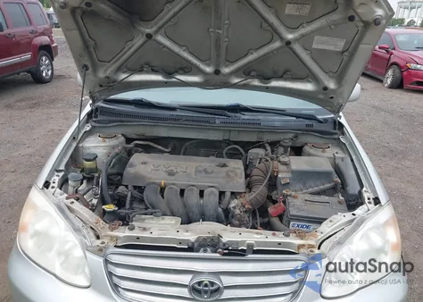 2004 Toyota Corolla Le z USA, uszkodzony, nr VIN 2T1BR32E84C259212